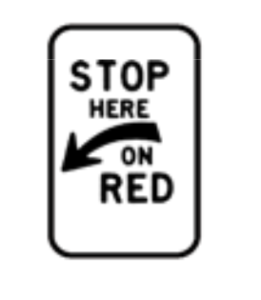 Vehicles must stop at the intersection when the traffic signals are red